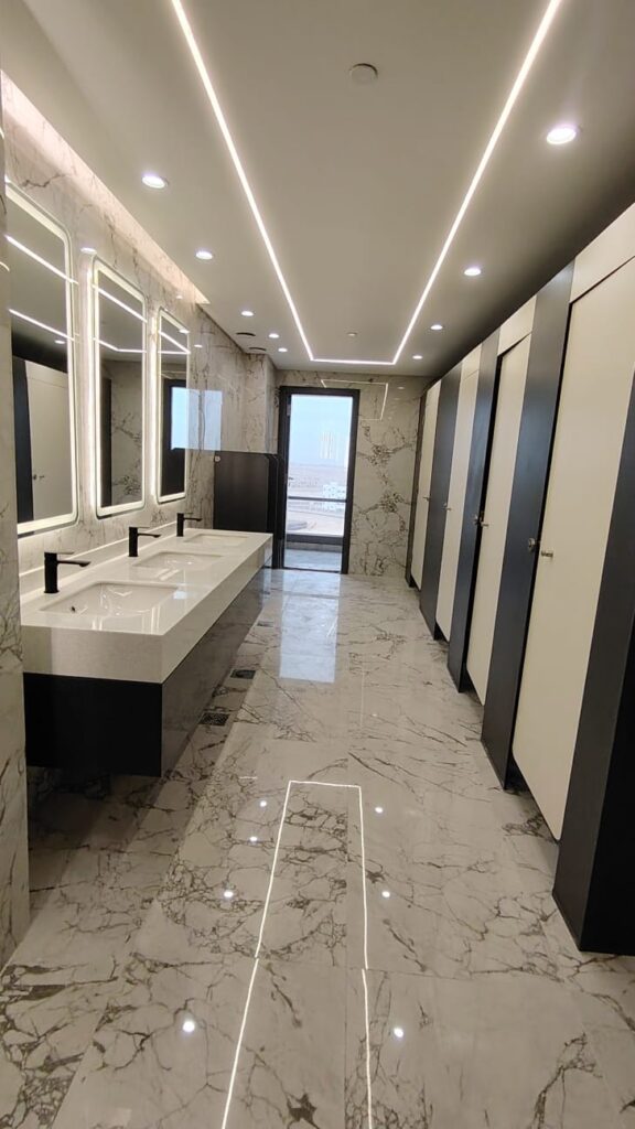 Seamless Corian wall cladding installed in hotel bathroom Heliopolis Cairo by Cairo House 