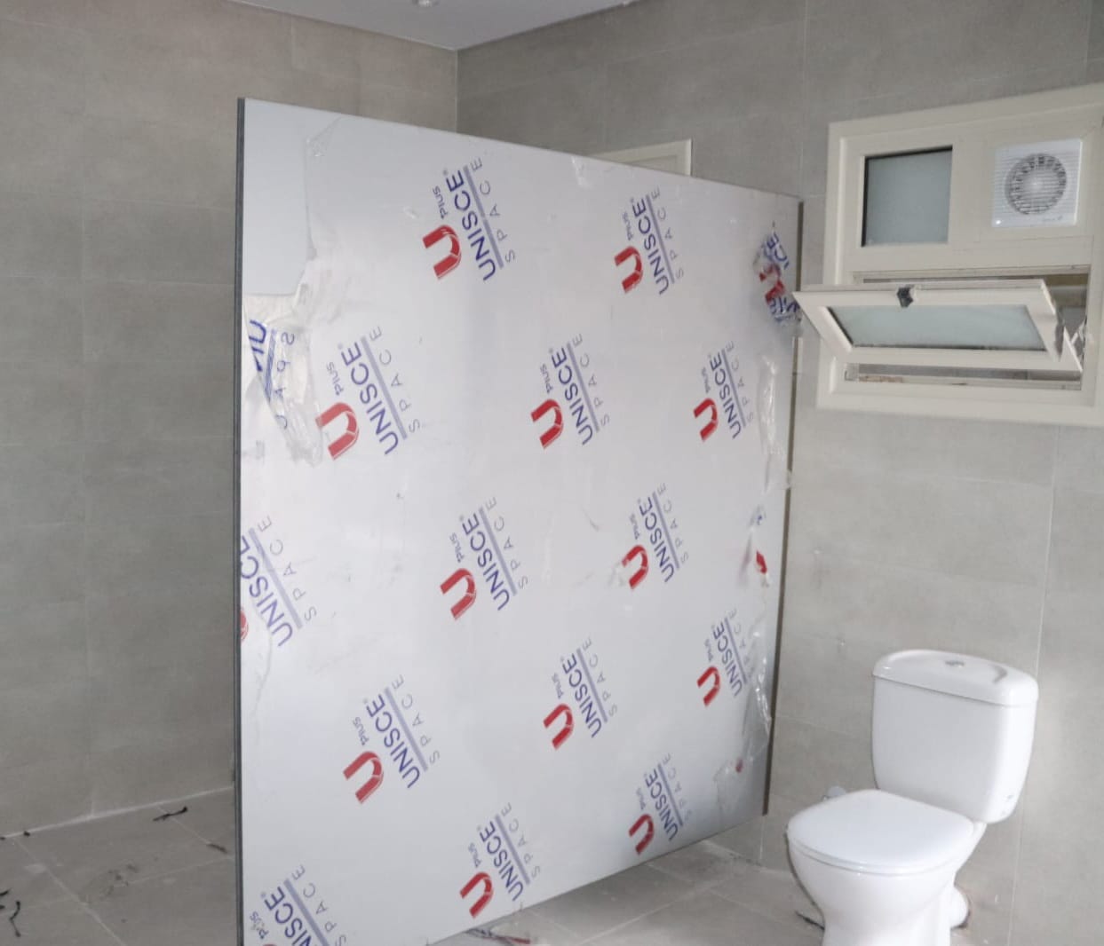Toilet partition cabin installed by Cairo House كايرو هاوس in Cairo, using HPL compact panels and metal fittings from a construction materials supplier Cairo clients use for restroom project execution.