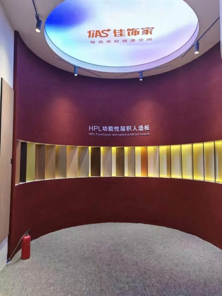 Showroom feature wall of HPL functional laminated boards in a full range of colours and wood tones. Cairo House uses displays like this so clients specifying Compact HPL in Cairo can see the finish range in one place before ordering.