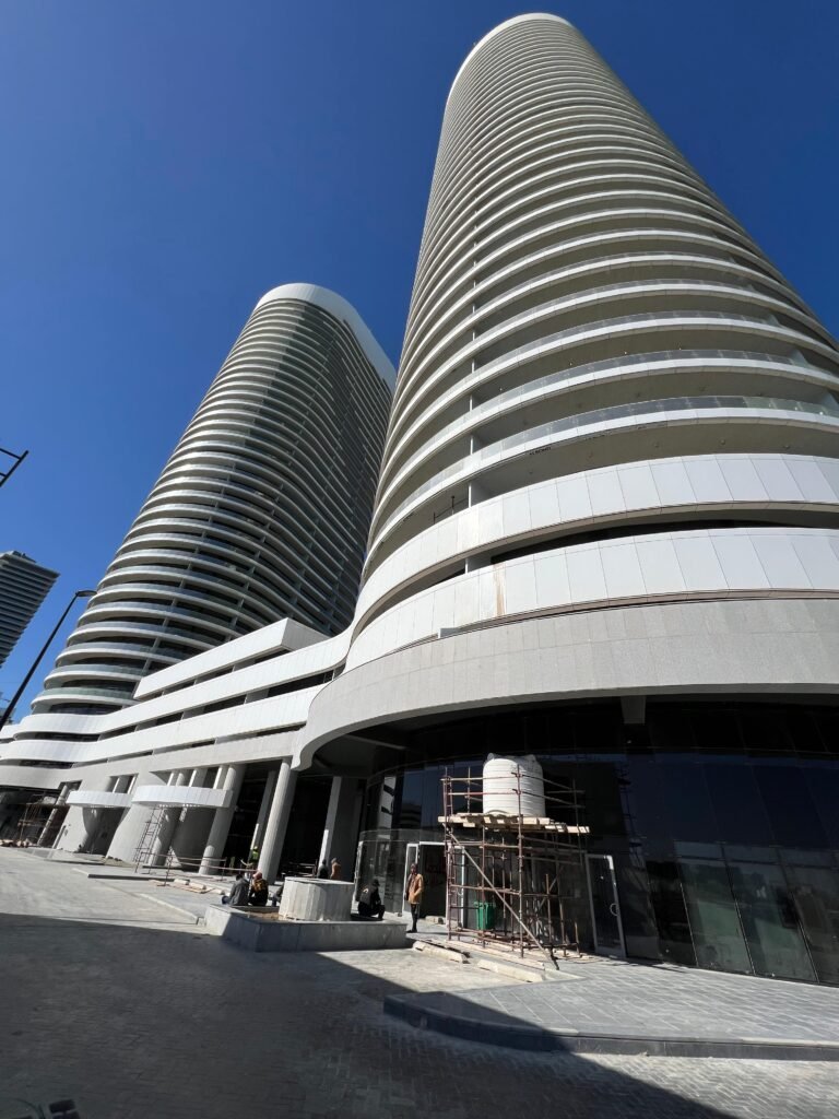 Twin Towers project visited by Cairo House for compact HPL washroom systems.