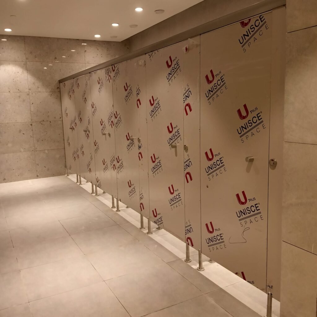 Long row of compact HPL toilet partitions supplied by the best compact HPL company in Egypt