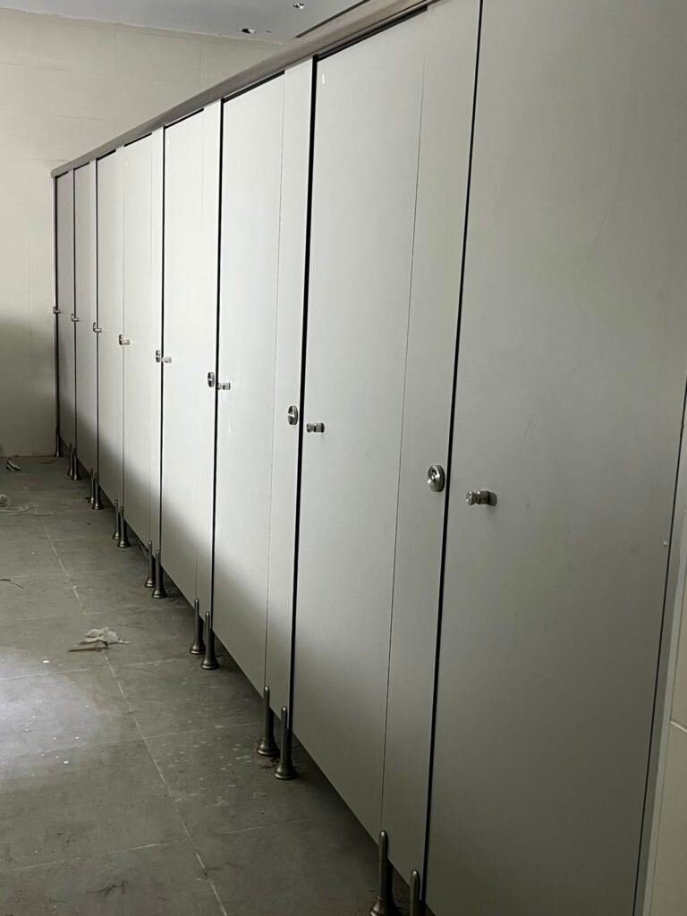 Sage green HPL partition row by Cairo House