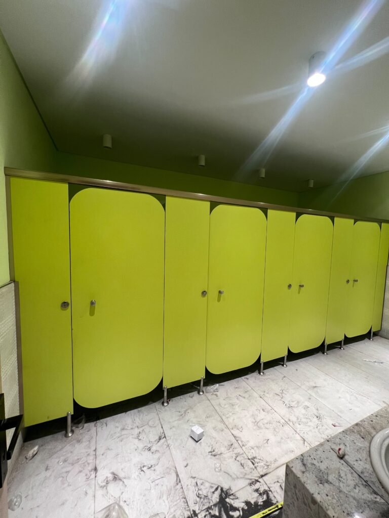 Finished lime compact HPL cubicles by Cairo House