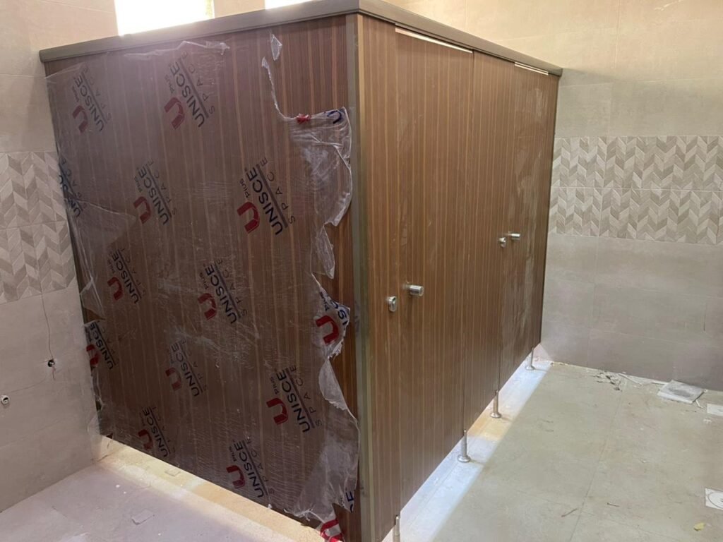 Dark Walnut compact HPL cubicles installed by Cairo House in Cairo